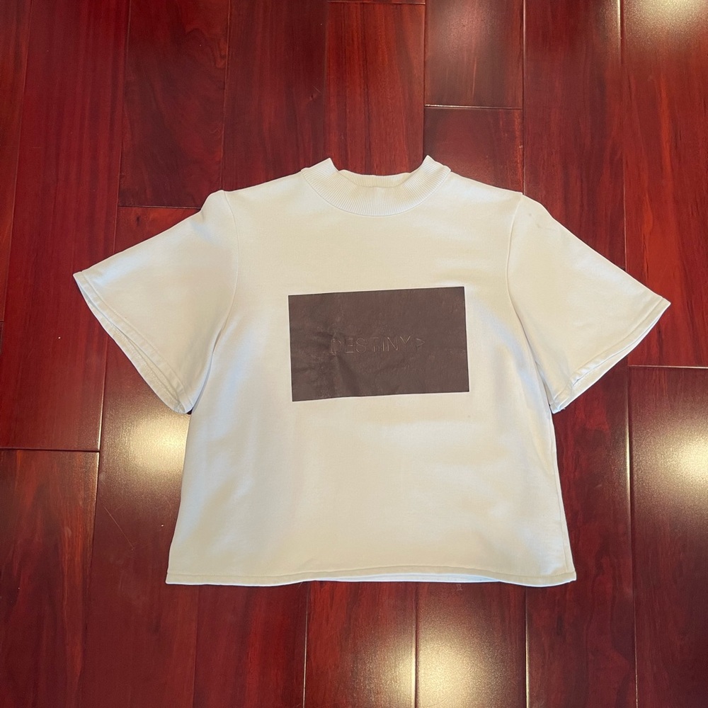 Cream T-Shirt with Faux Leather Graphic